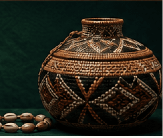 Handcrafted traditional pottery with cowrie shells